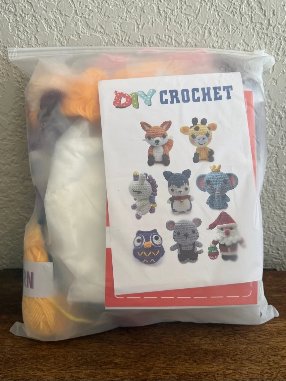 DIY Crochet 8-Piece Kit with Yarn and Instructions for Multiple Figures